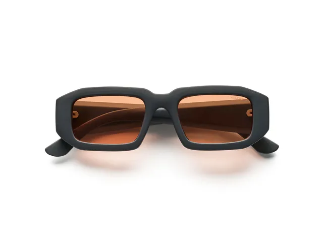 komono-blaze-carbon-sunset-sonnenbrille-rechteckig-transluzent-gelb-schwarz-100- image 1